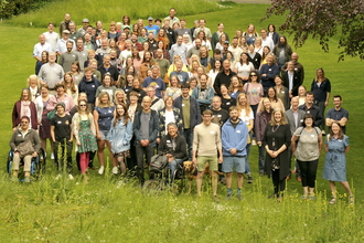 A photograph of all of Yorkshire Wildlife Trust's staff stood as a group