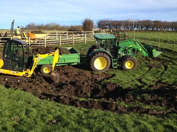 Removing silt from dew pond