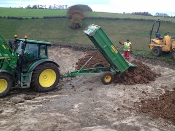 Adding clay to dew pond