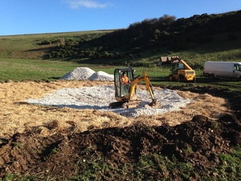 Covering dew pond with chalk