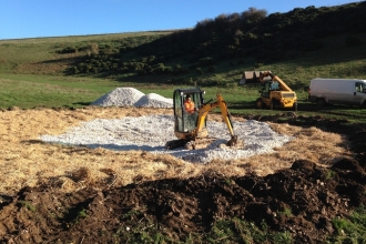 Covering dew pond with chalk