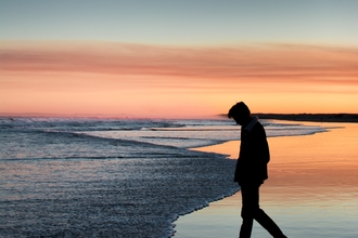 Person walking on beach