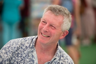 A profile photograph of naturalist, broadcaster and producer Stephen Moss