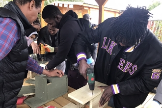 People building nest boxes