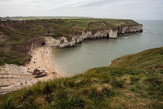 A photograph of North Landing beach from the top of Flamborough Cliffs.