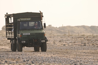 Unimog crossing the washover