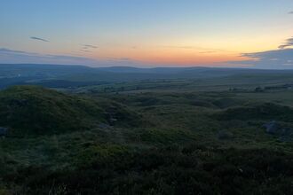 View across open moorland in Calderdale at sunset