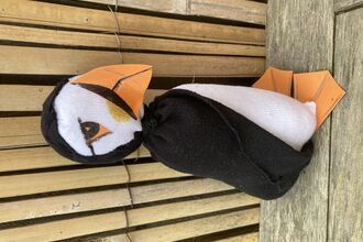 sock puffin made by thread and press cic