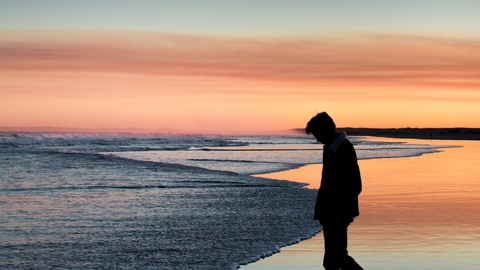 Person walking on beach