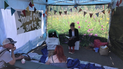 Picture of Jenna leading a storytelling session at Puffin Festival 2024