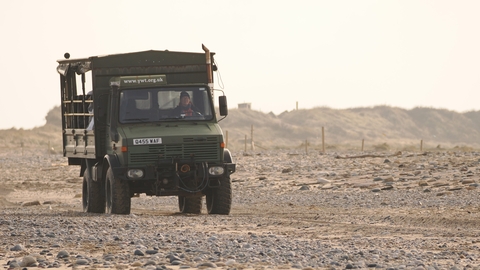 Unimog crossing the washover