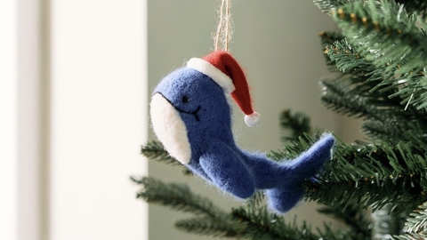 needle felted christmas whale with santa hat