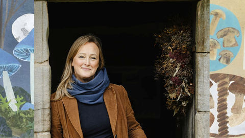 Author Sally Coulthard between fungi illustrations