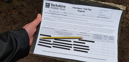 Volunteer time sheet redacted