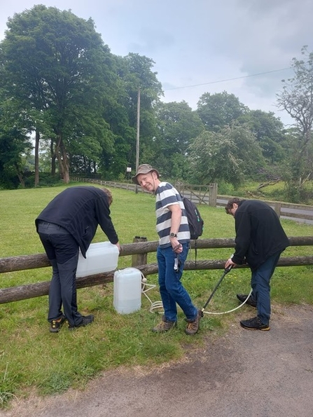 Cleaning Howard's boots after INNS surveying