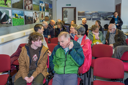 Volunteers chatting to each other at a Discovery Day