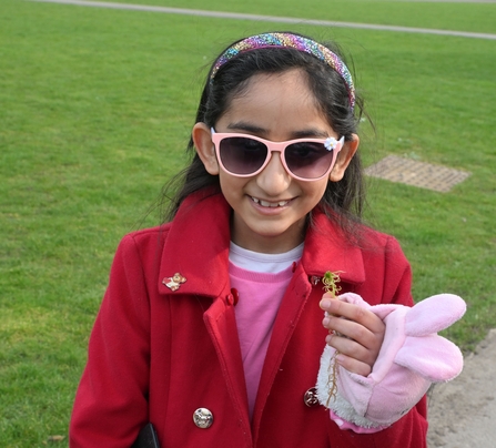 Girl holding sphagnum moss