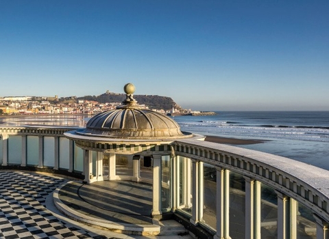 Scarborough Spa buildings (white columns and central section in a semicircle), looking out to the sea