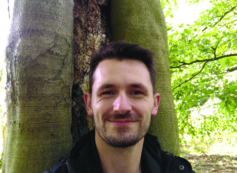 Pete Gurney, reserves officer, smiling at the camera
